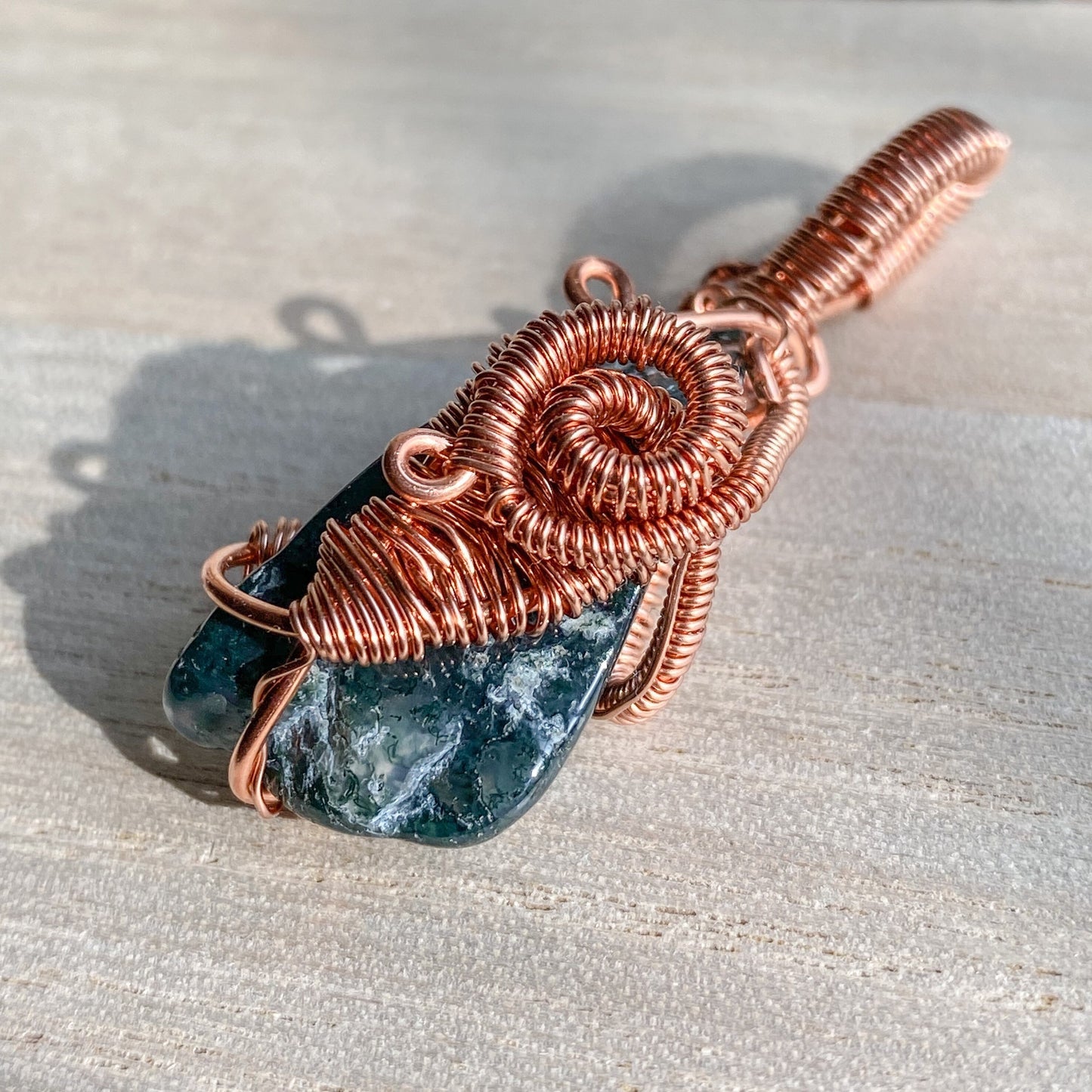 Abundance in New Beginnings Moss Agate Copper Wire wrapped Pendant