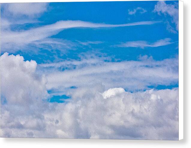 Blue Sky and Fluffy Clouds - Canvas Print