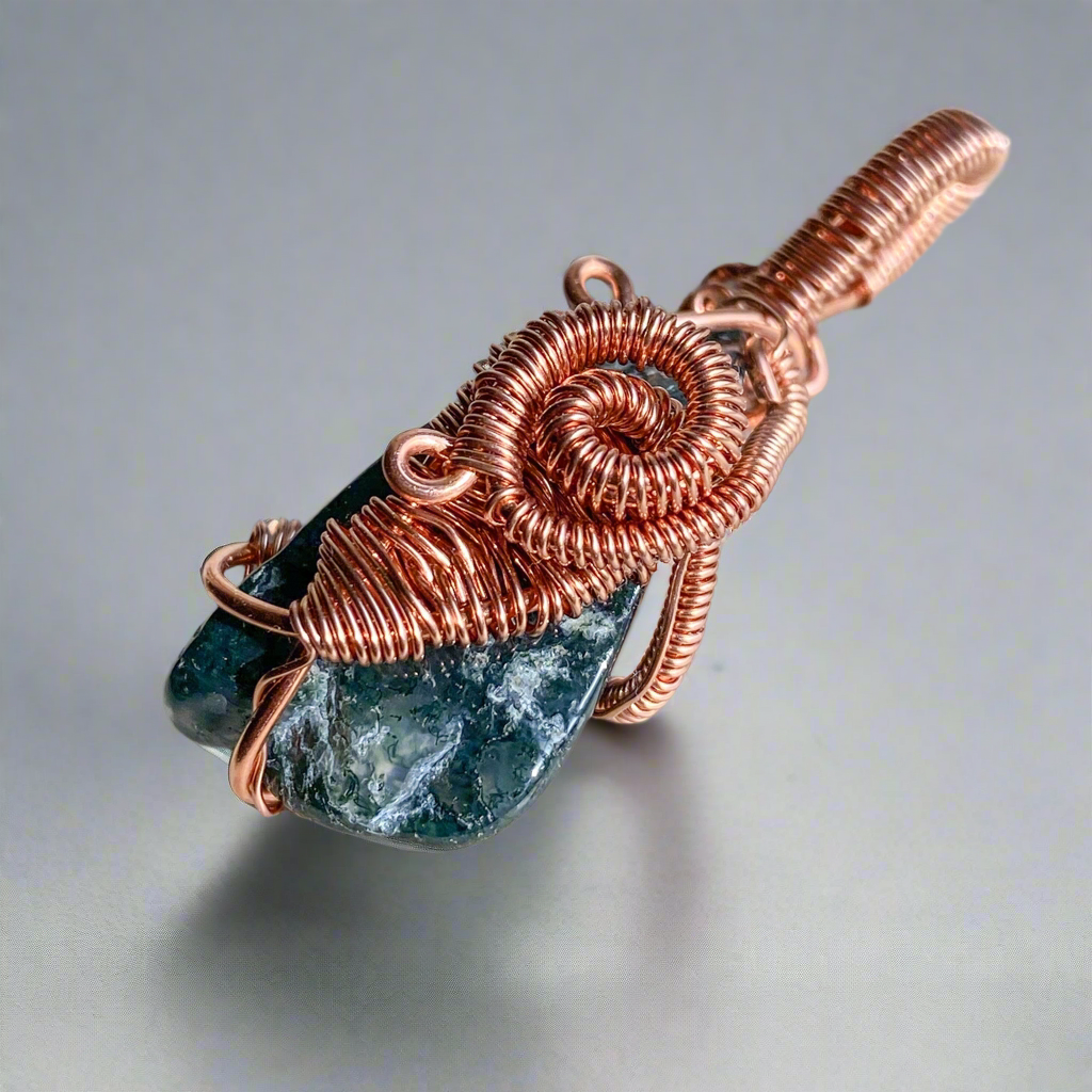 Abundance in New Beginnings Moss Agate Copper Wire wrapped Pendant