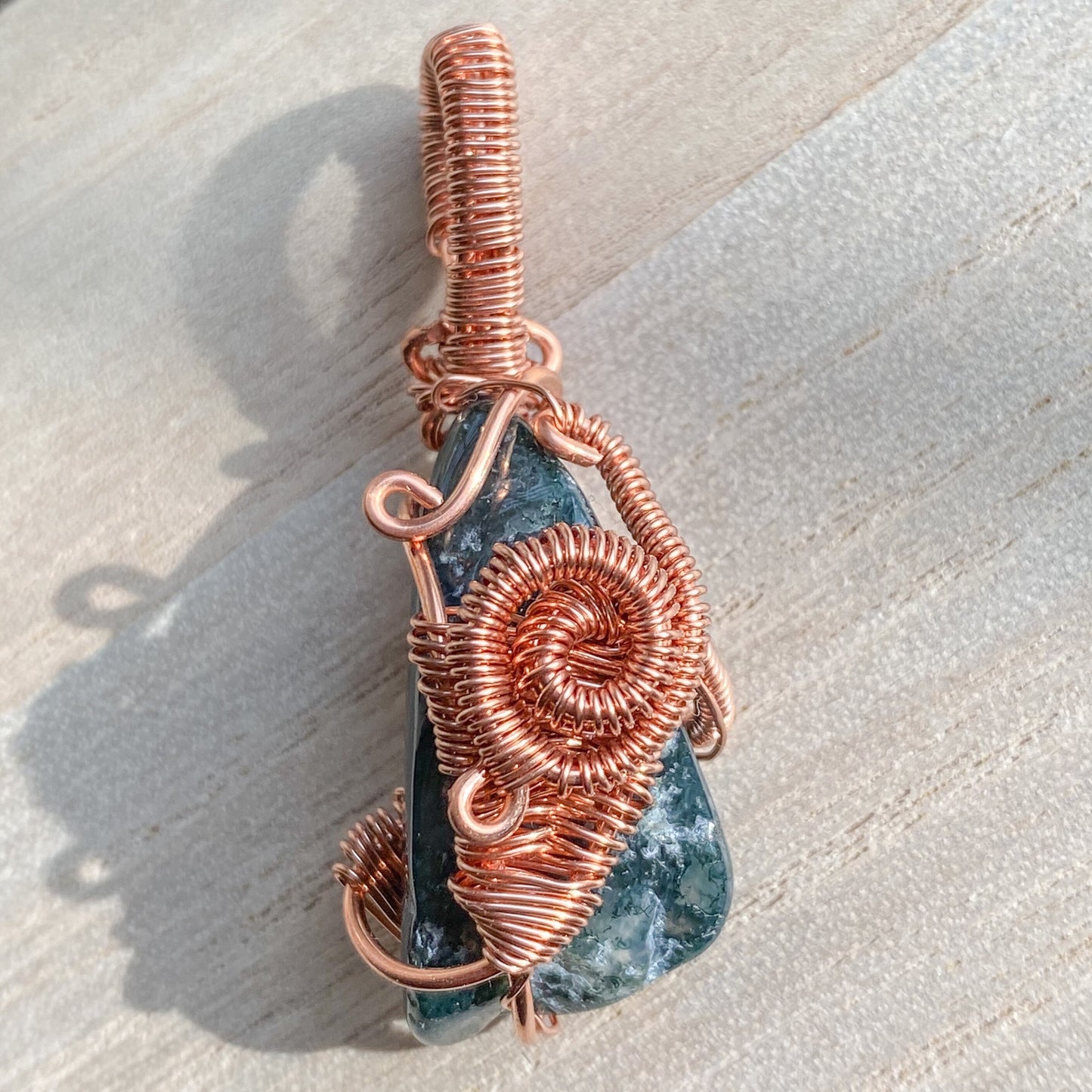 Abundance in New Beginnings Moss Agate Copper Wire wrapped Pendant
