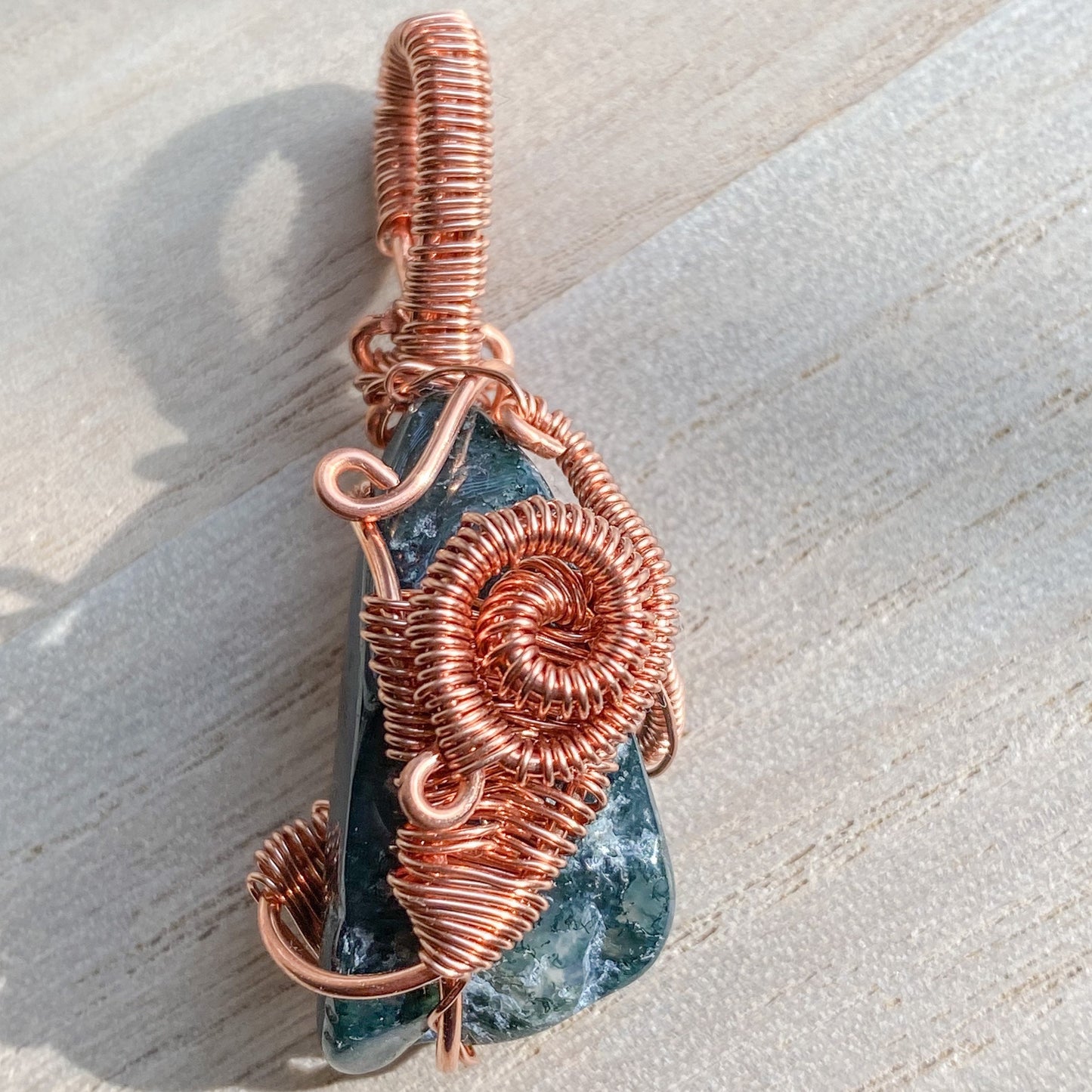 Abundance in New Beginnings Moss Agate Copper Wire wrapped Pendant