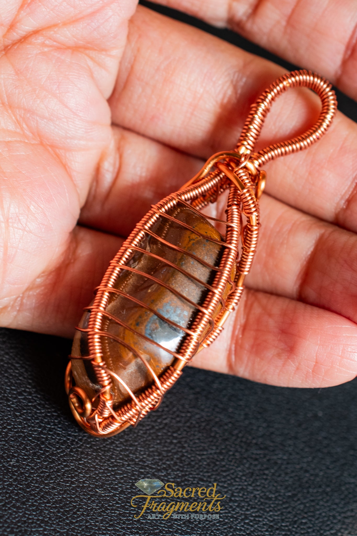 Tiger Iron Copper Wrapped Pendant
