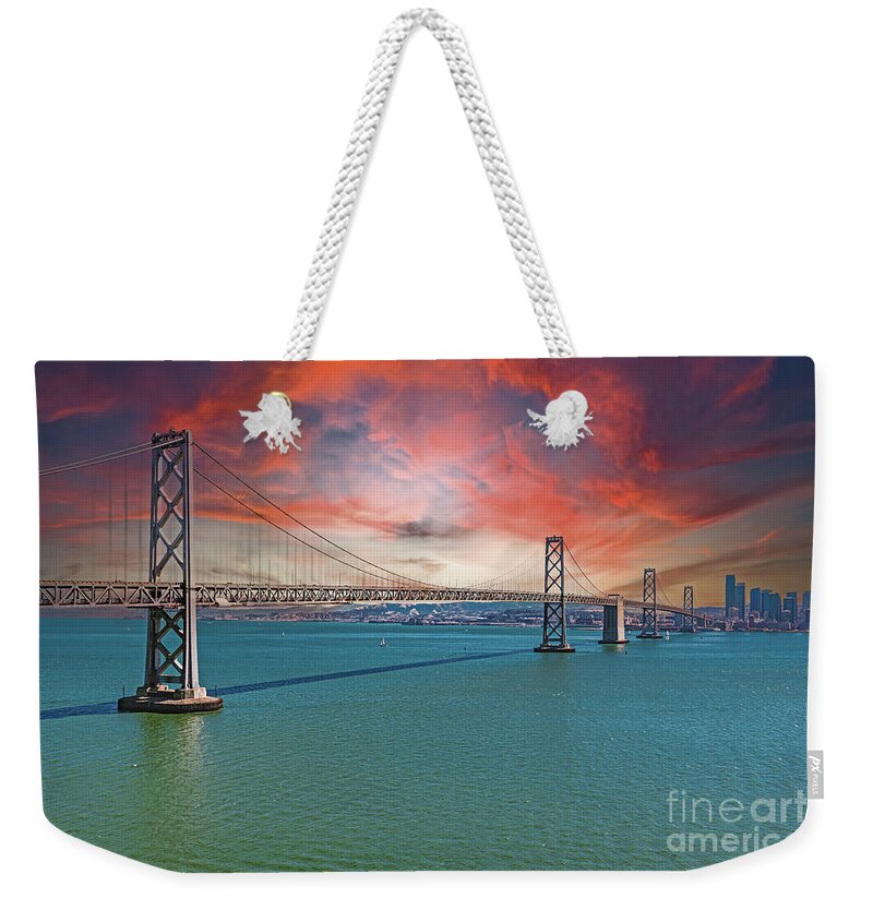 Oakland Bay Bridge Creative Clouds Over The Pacific Ocean in San Francisco - Weekender Tote Bag