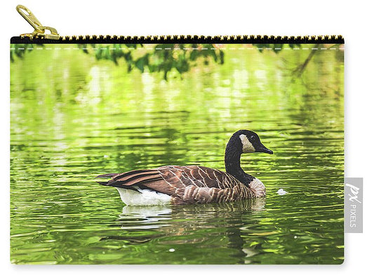 Solitary Goose on Tranquil Pond - Zip Pouch